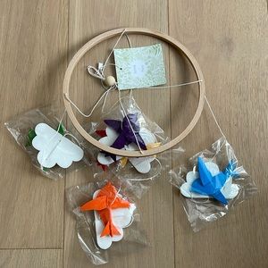 Sorrel and Fern baby crib mobile, rainbow birds and clouds.